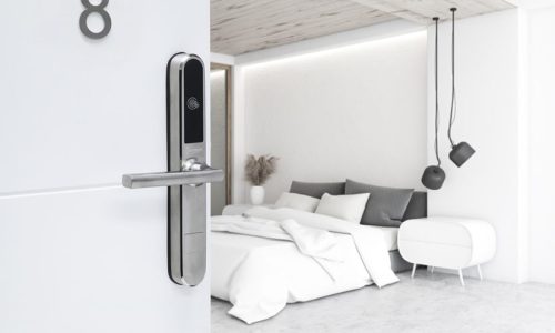 Corner of luxury minimalistic bedroom with white walls, concrete floor, master bed with two bedside tables and stylish ceiling lamps. Bathroom with shower in background. 3d rendering